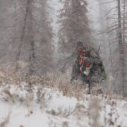 Hiking in snow while hunting